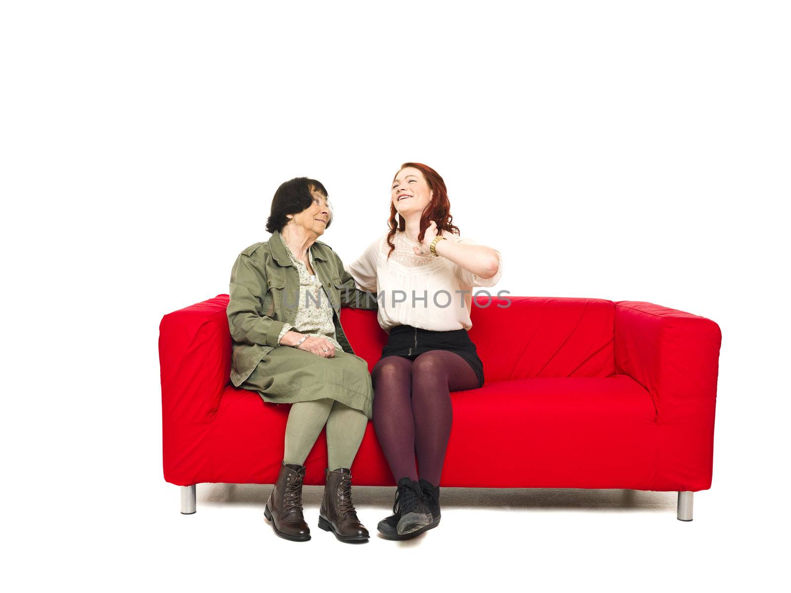 Grandmother and Grandchild sitting in a sofa