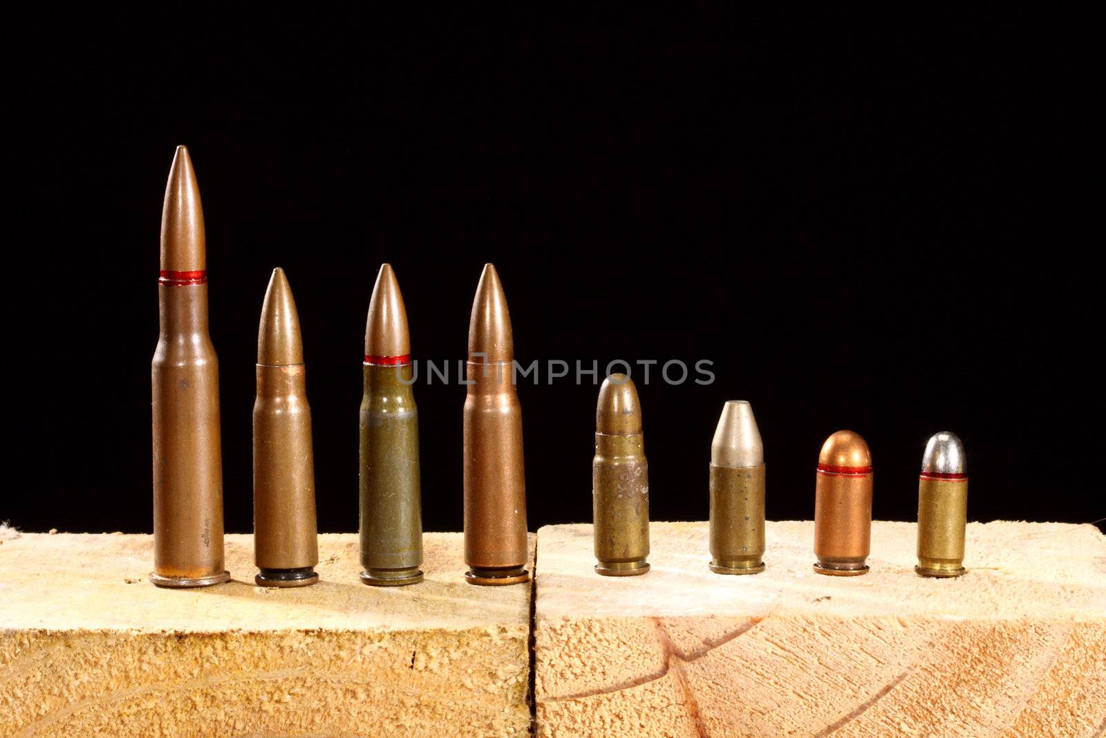 Different ammo close up over black background