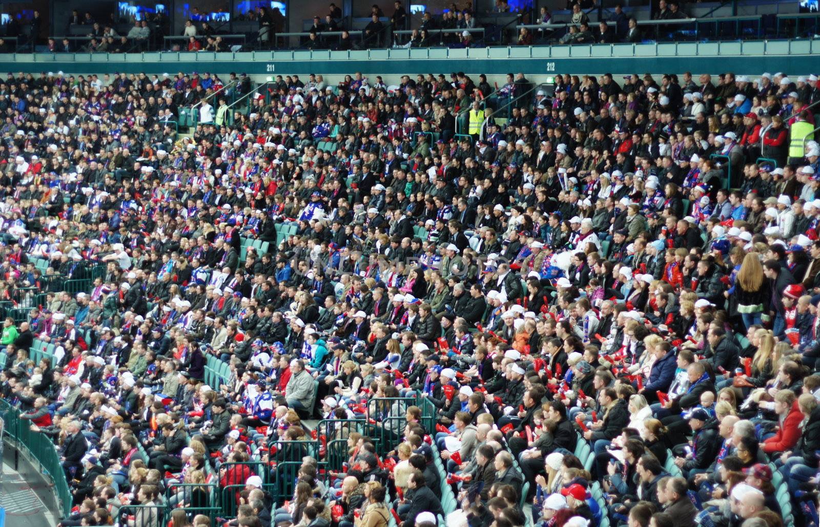 Hockey fans in the stadium's podium