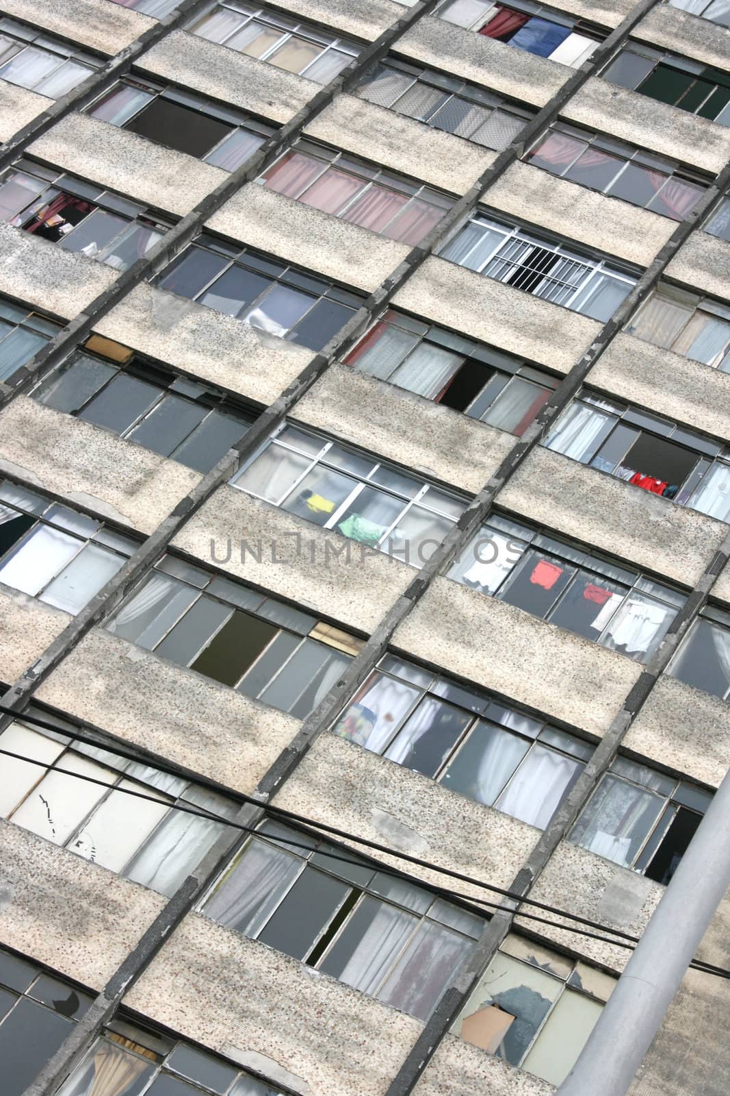 Facade of a rundown building in a poor neighborhood in the center of Sao Paulo, Brazil.