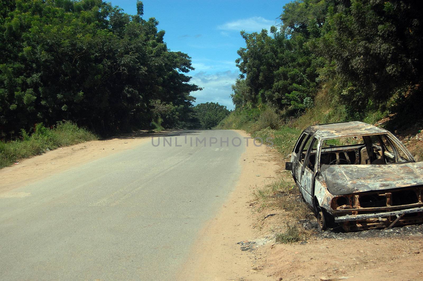 Abandoned car at roadside, Port Moresby, 6th Mile, Papua New Guinea