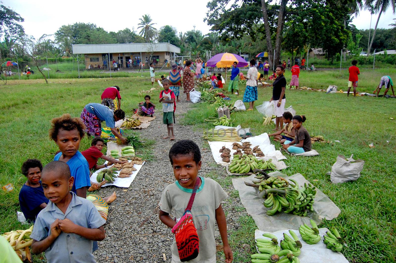 People on market at the village in Papua New Guinea