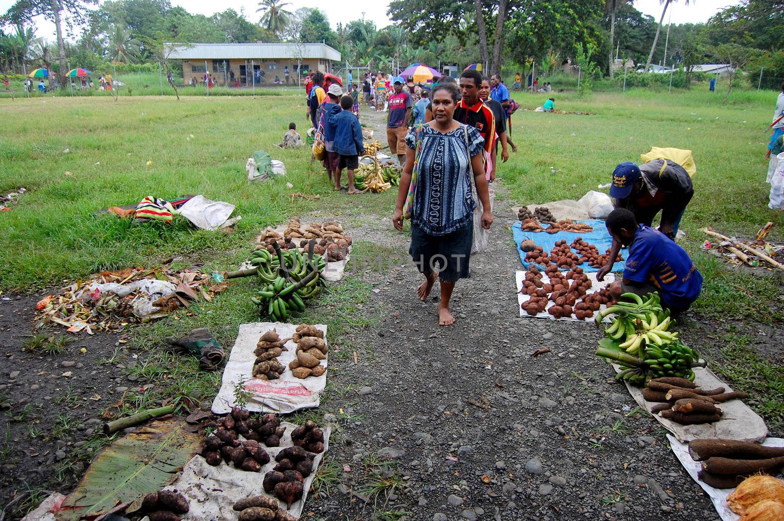 People on market at the village in Papua New Guinea