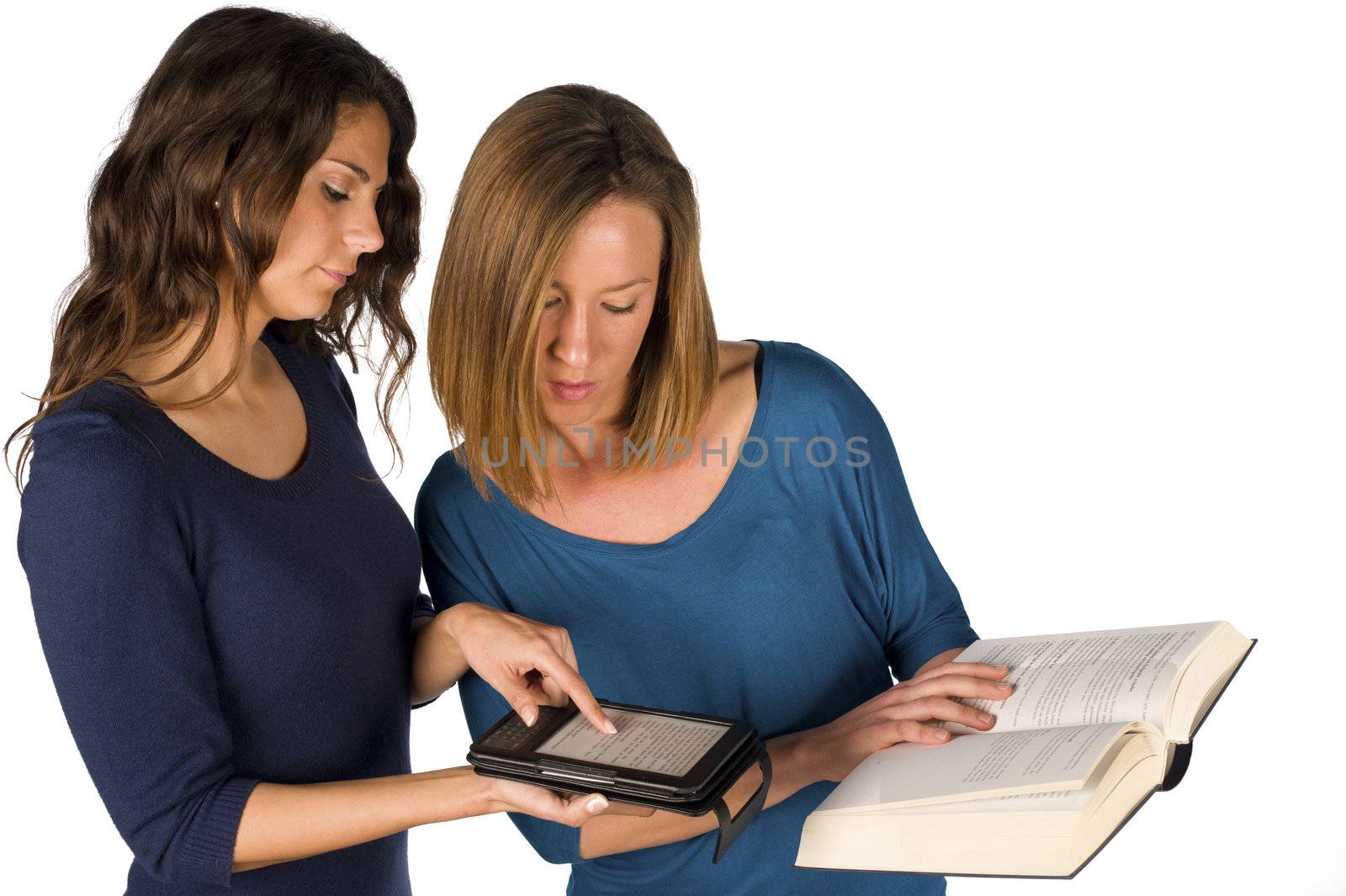 Students comparing a paper and an electronic book