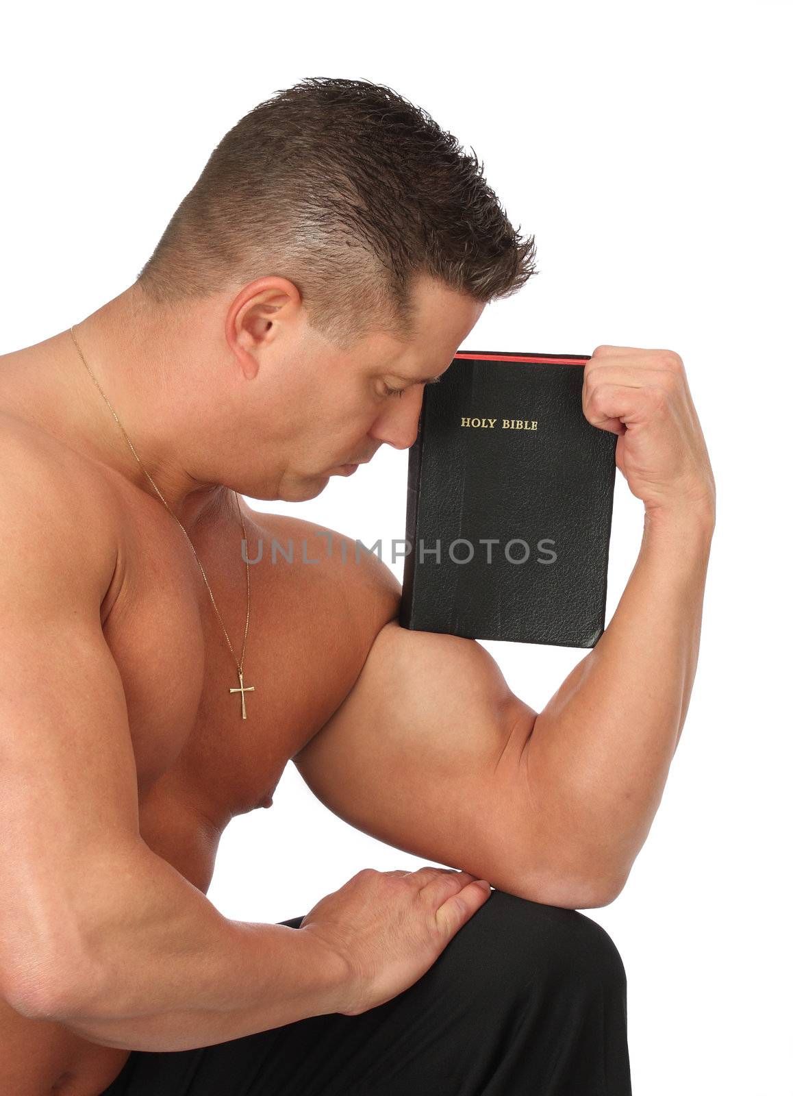 Muscle Man with Holy Christian Bible by libyphoto