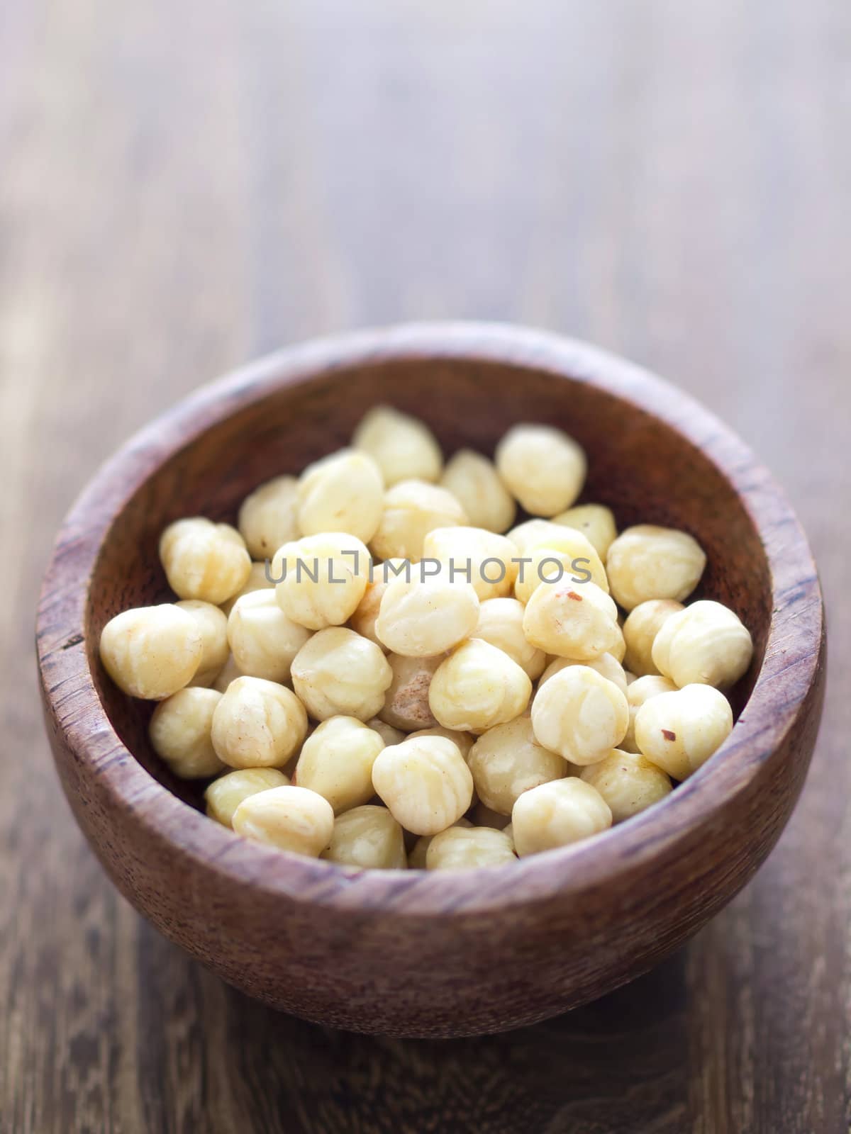 close up of a bowl of hazelnuts