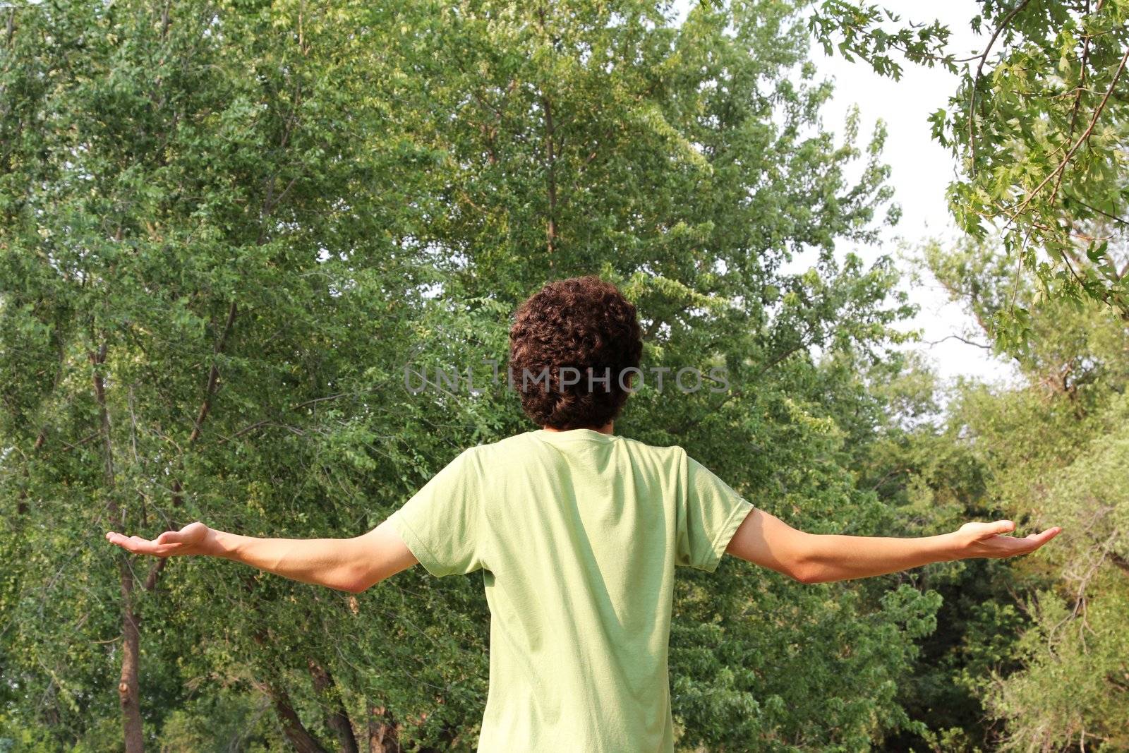 A youth looks to the heavens for guidance