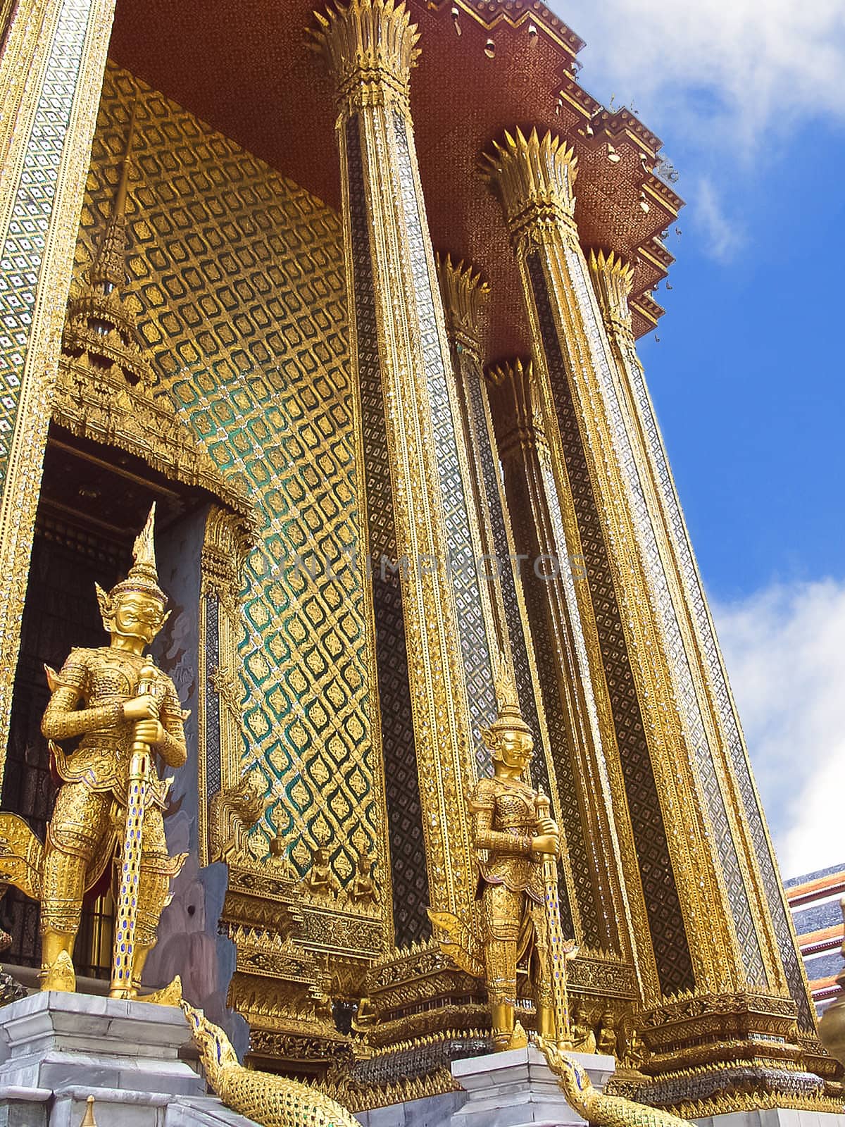 Guards of the temple Wat Phra Kaew in the Grand Palace in bangkok, Thailand