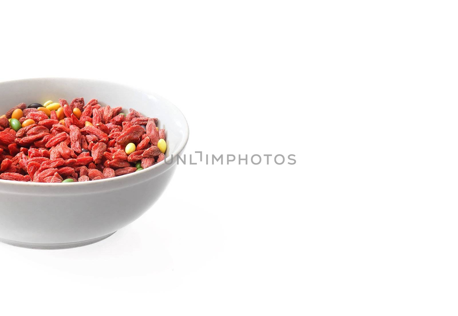 red dried goji berries traditional chinese herbal medicine (wolfberry) isolated on white 