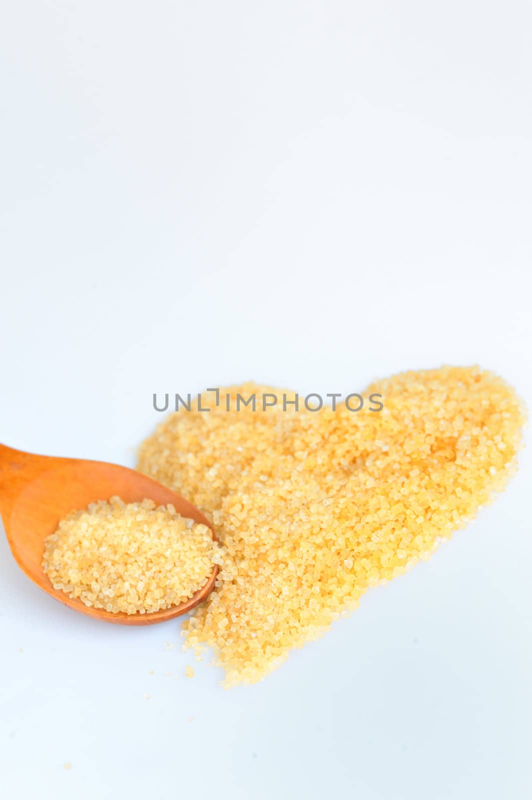 spoon overflowing with brown sugar