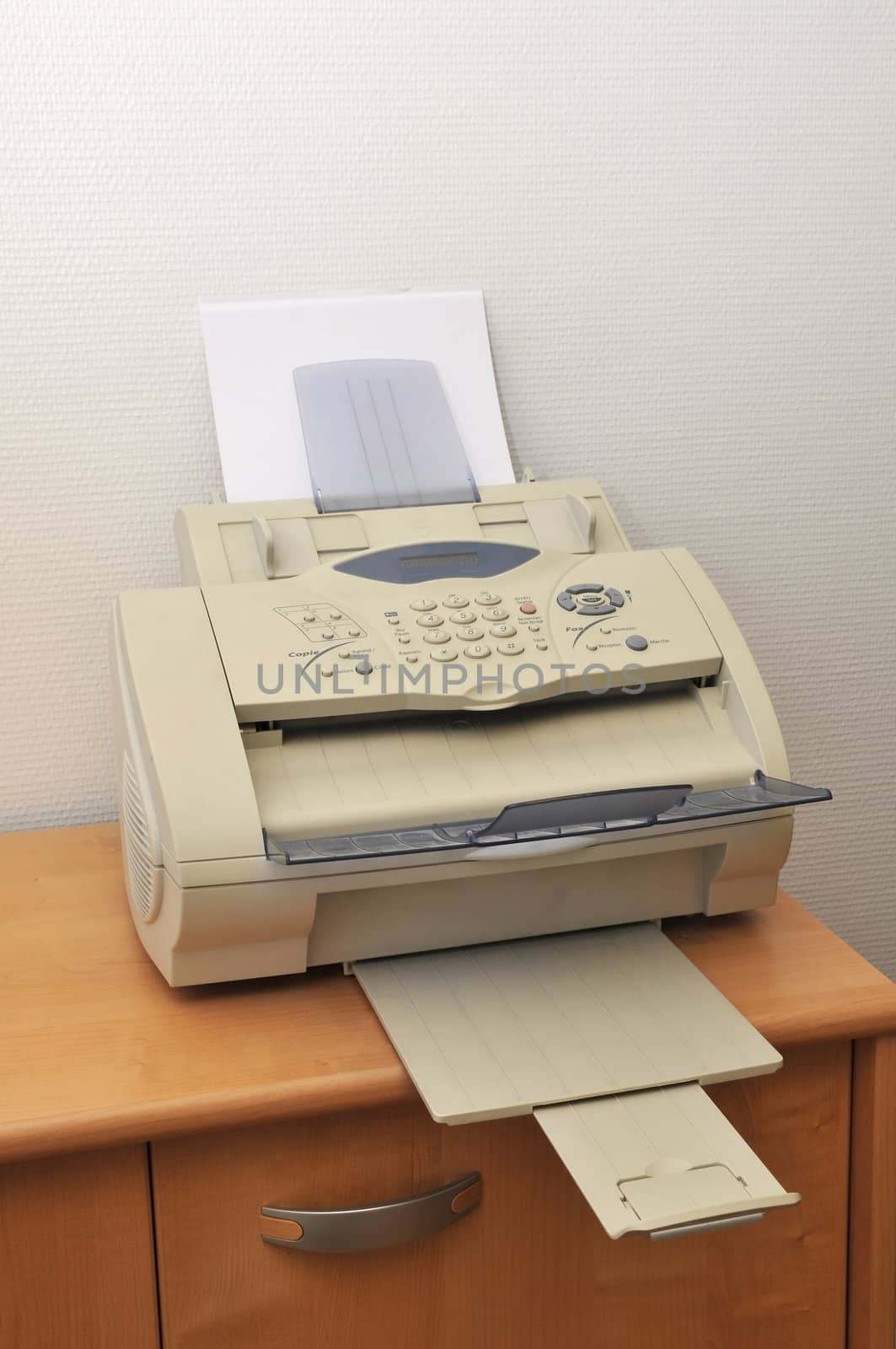 Old fax in office on a furniture