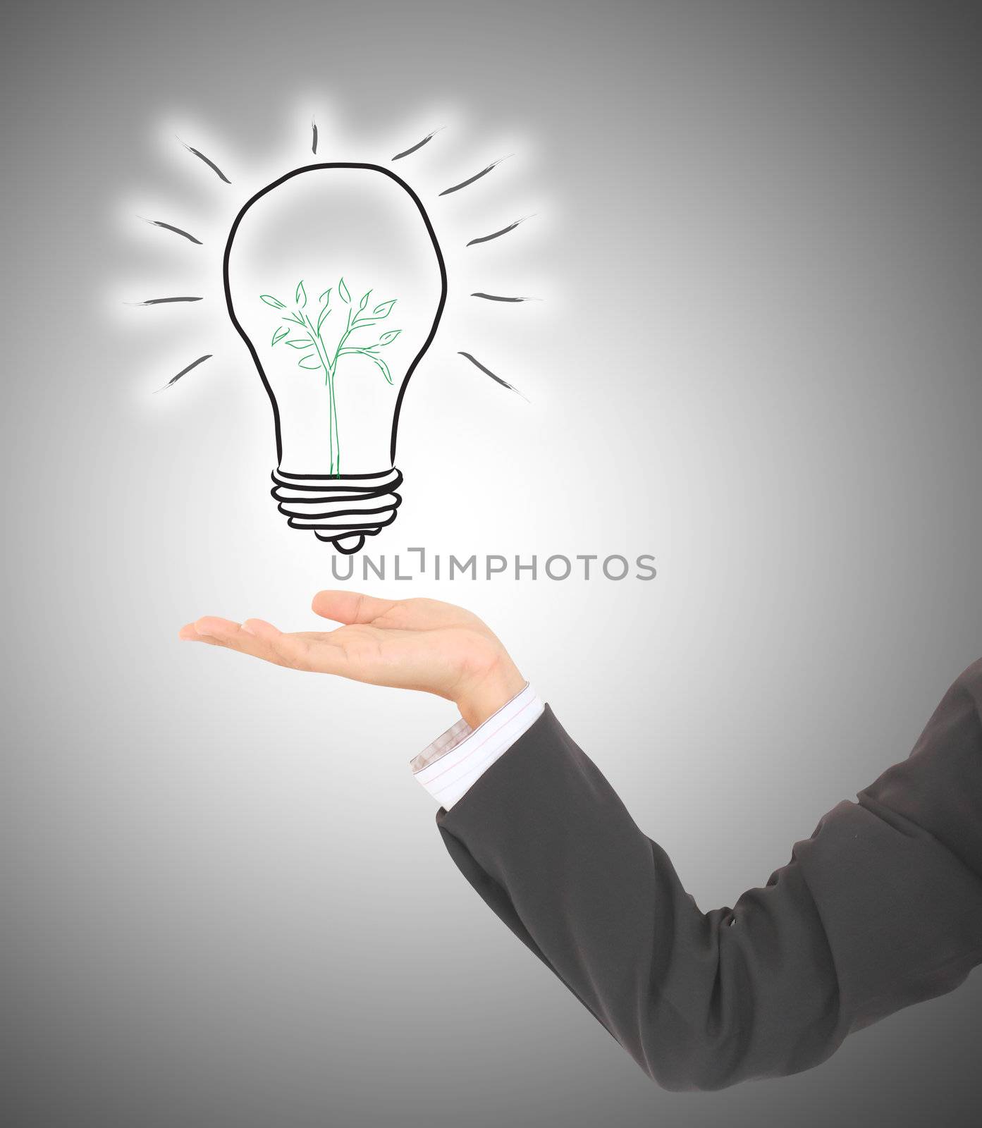   man pointing at alternative green energy saving light bulb sym by rufous