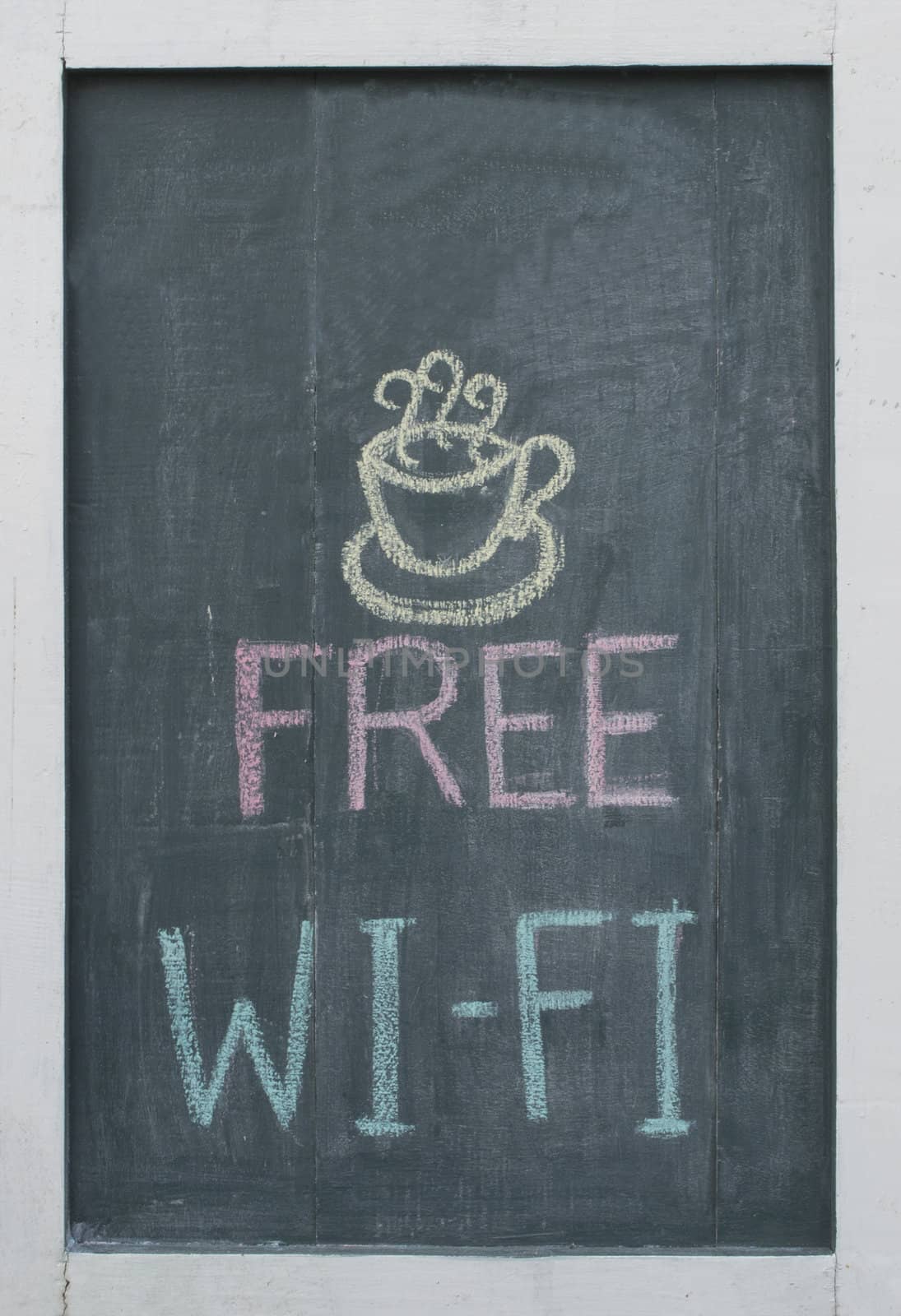 Free Wi-Fi chalk text written on blackboard at restaurant