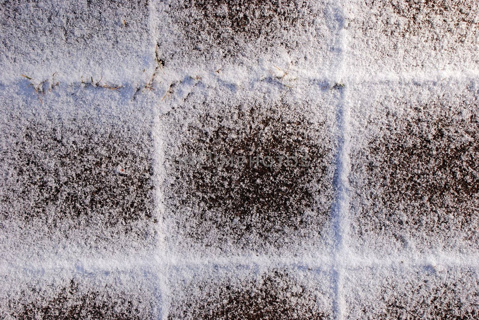 Snow-covered tiles by sauletas