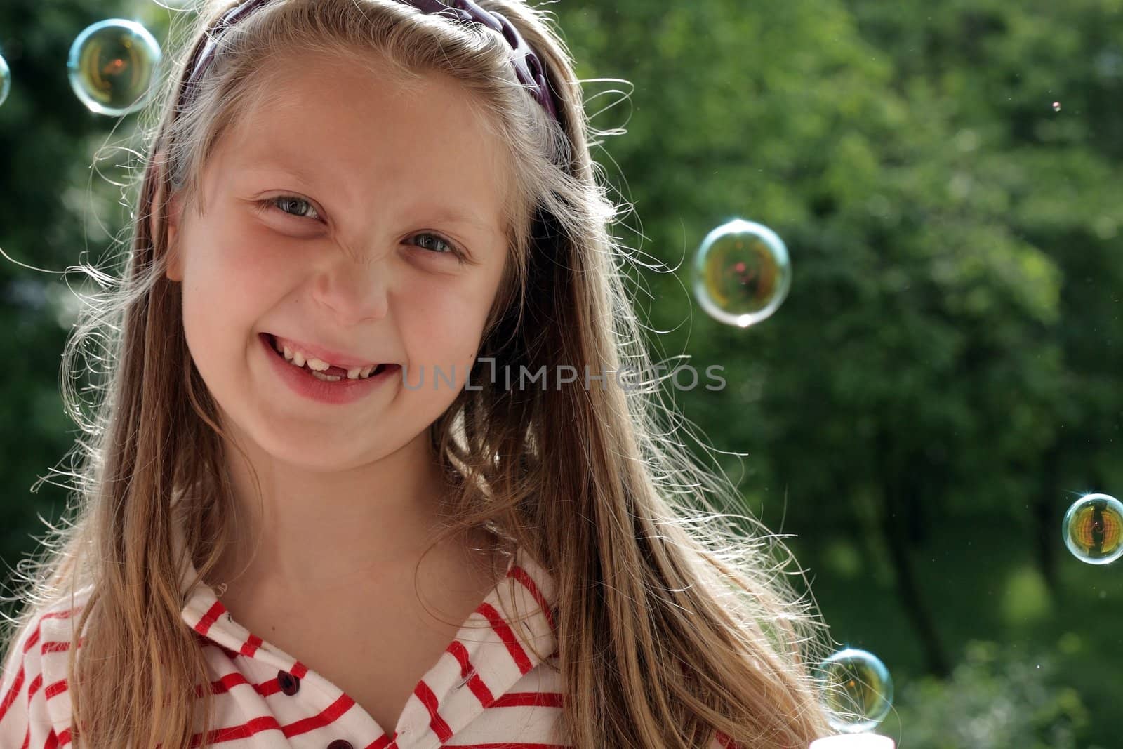 An image of a nice little girl laughing