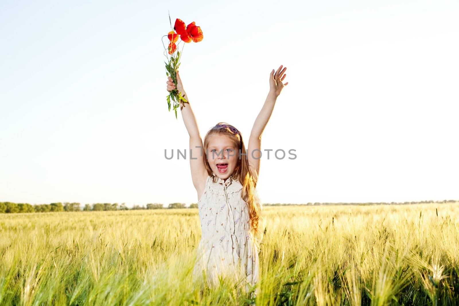An image of a nice little girl in the field