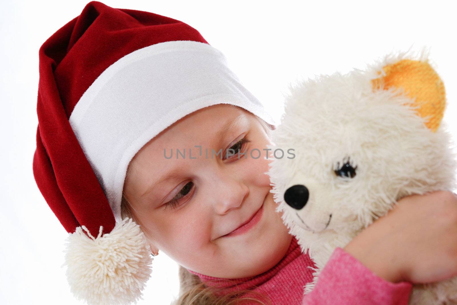 Cristmas theme: child in red hat with toy