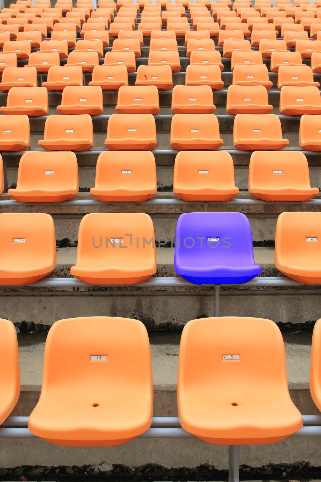 Empty stadium chairs, representing individuality  by rufous