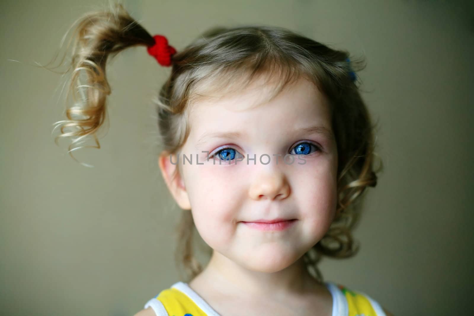 A portrait of a nice blue-eyed girl 