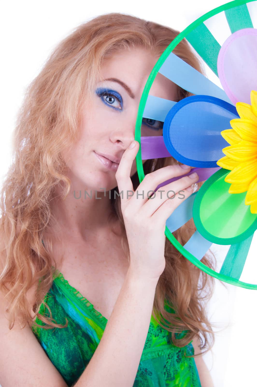 Beautiful woman with weather colorful vane over white