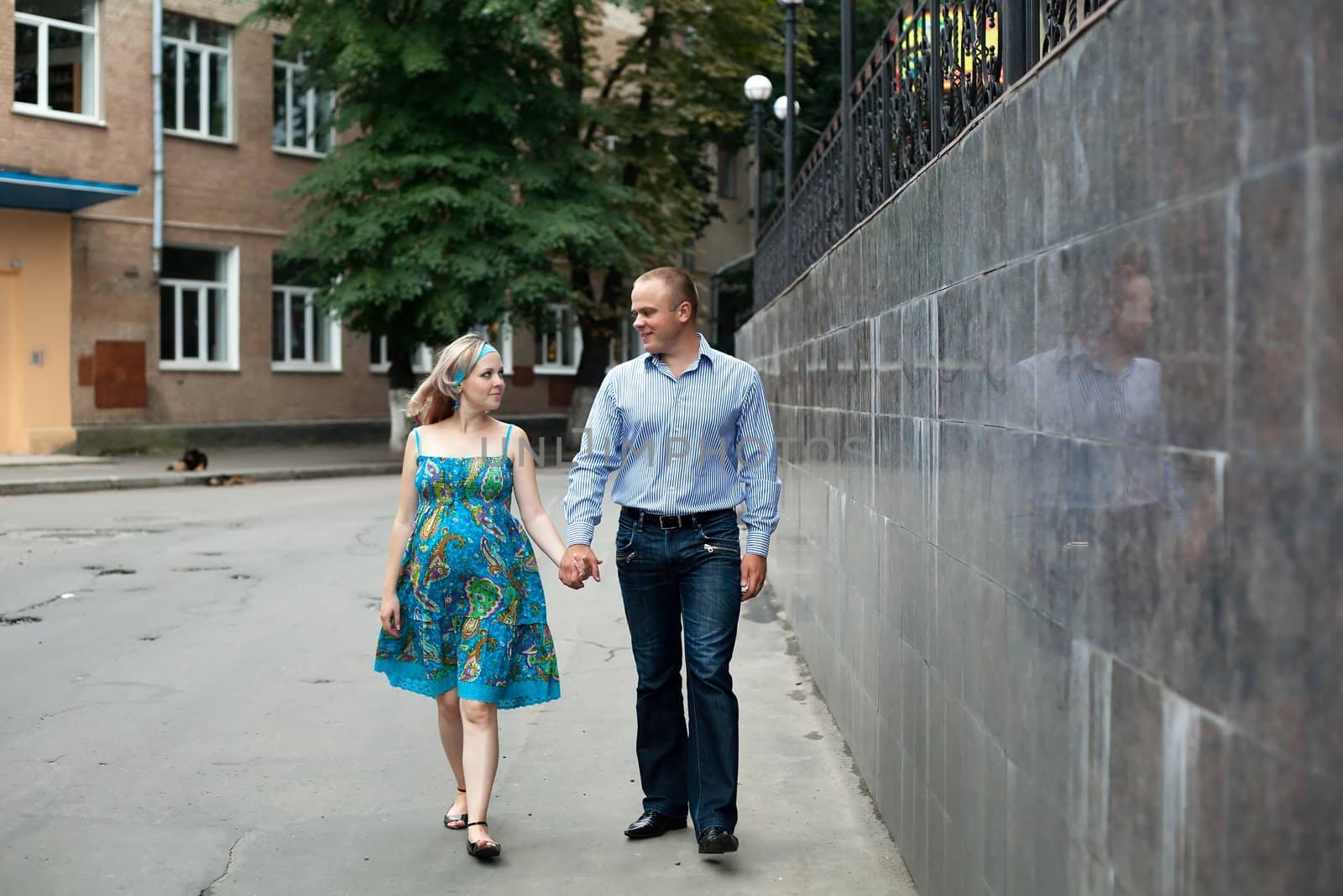 Young couple in the street by velkol