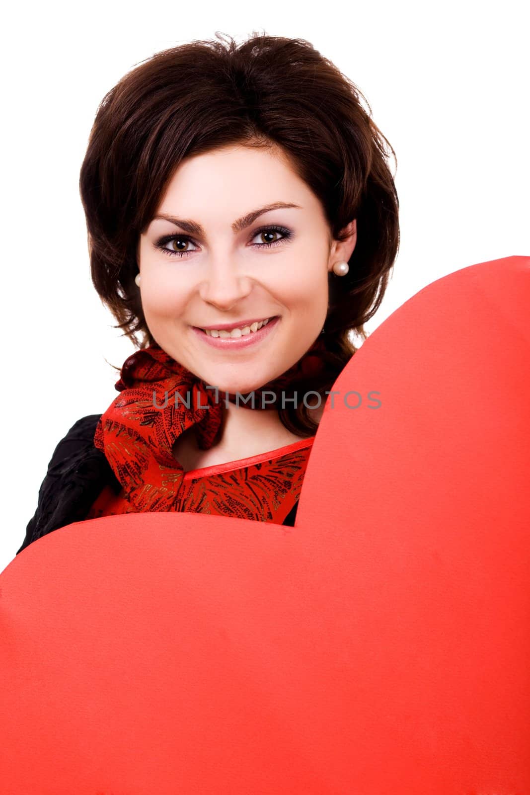 A nice girl keeps a big red paper heart