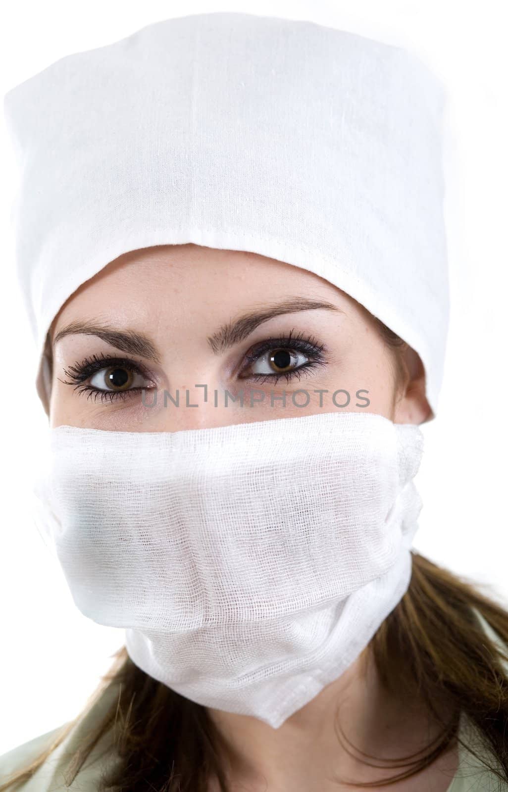 A nurse in a white cap and white band