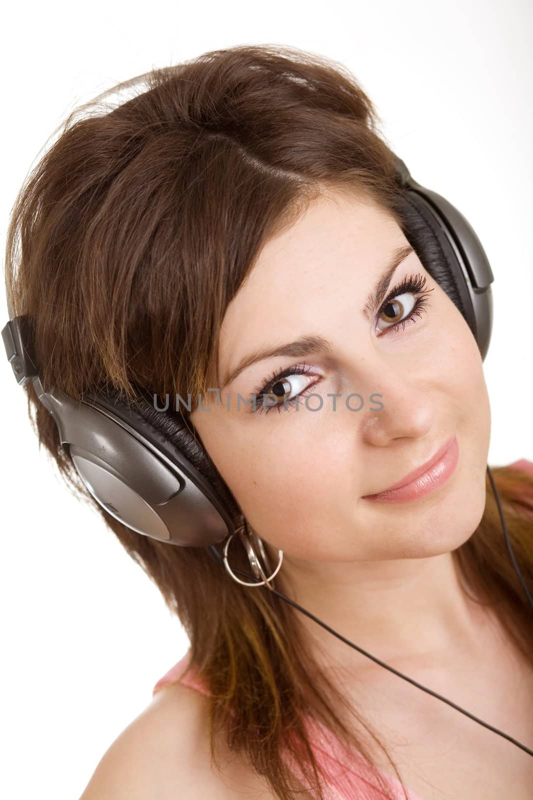 The woman in headphone listening to music