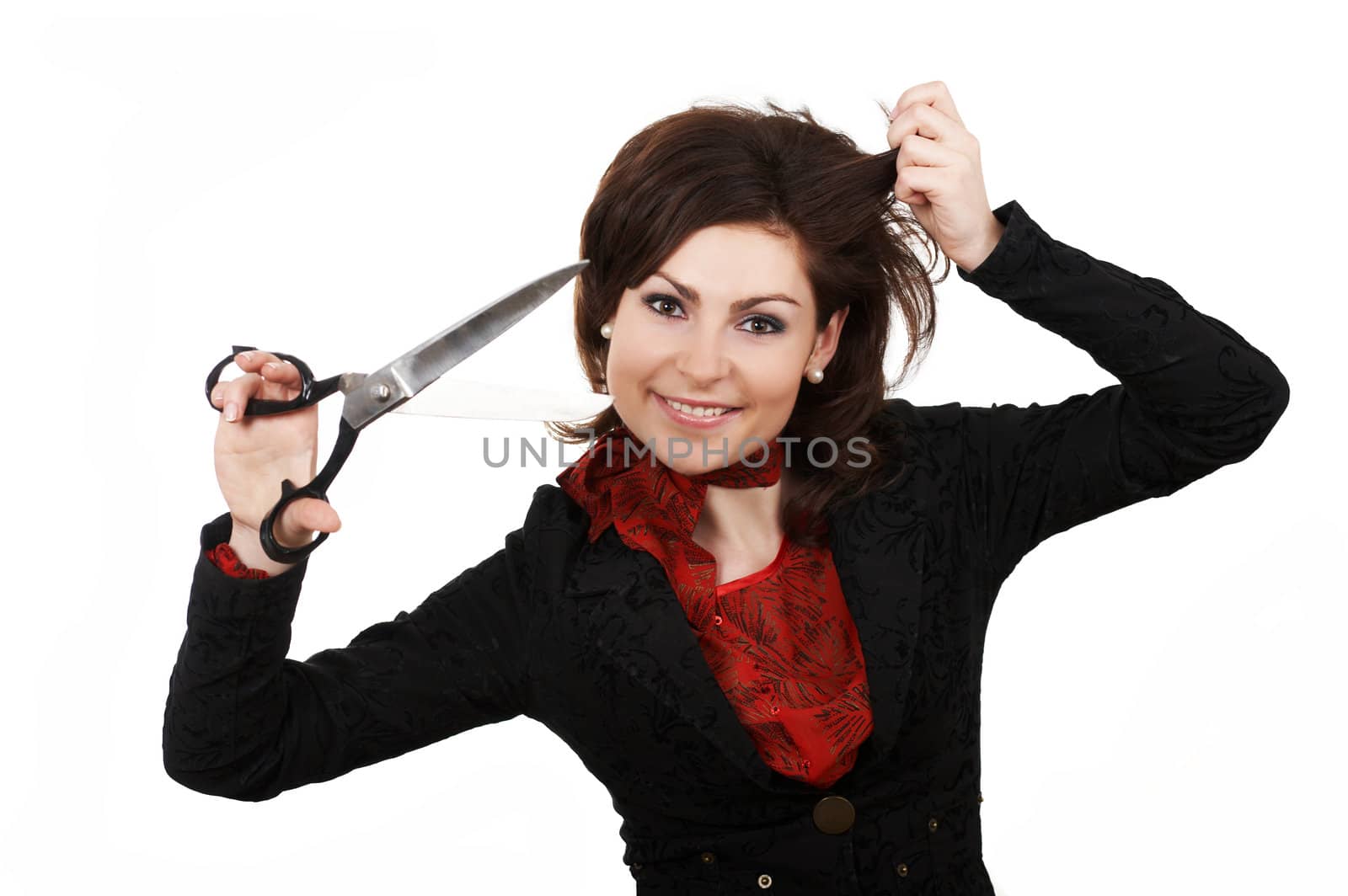 A woman with scissors going to cut her forelock