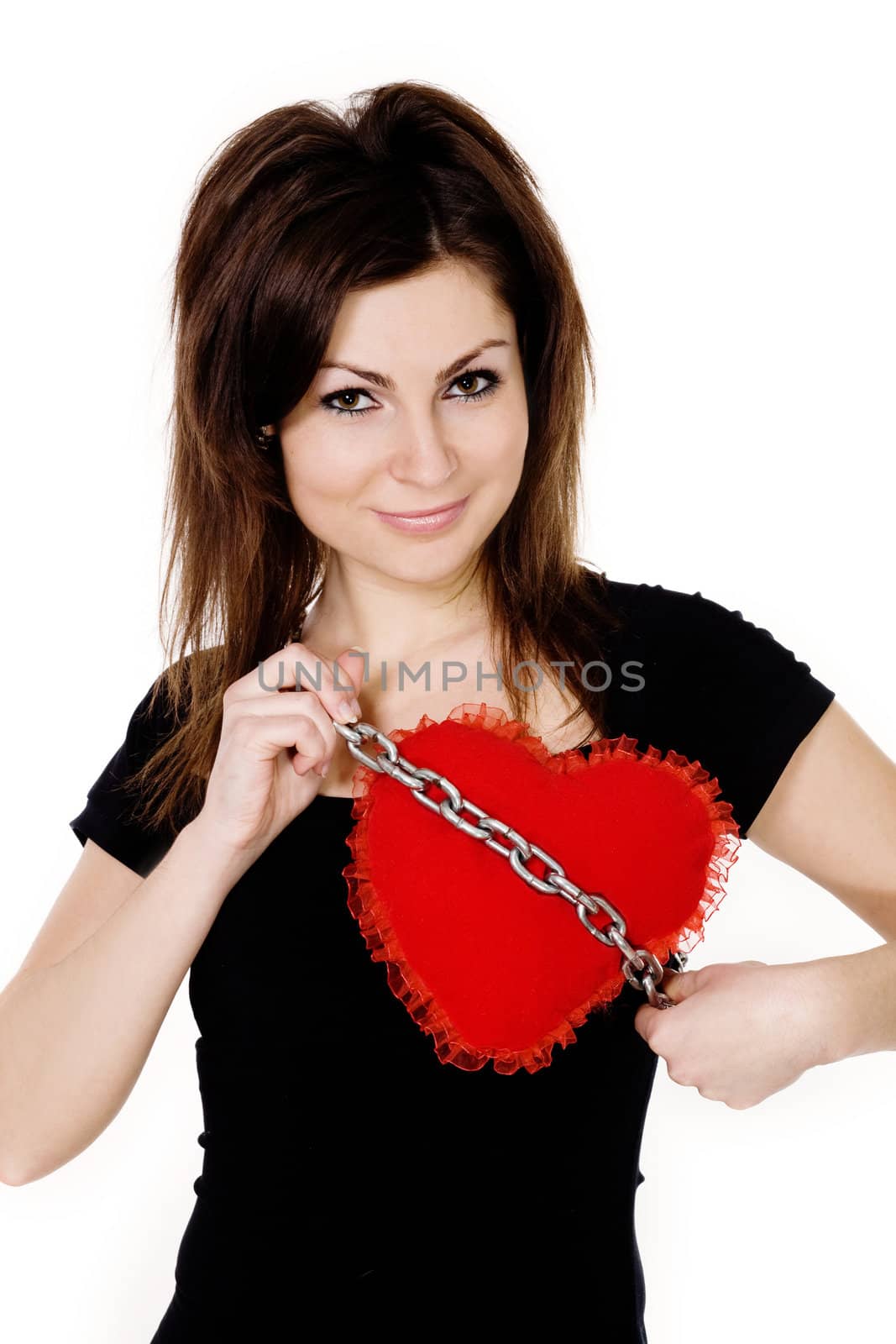 Stock photo: an image of a nice girl with a red heart on a chain