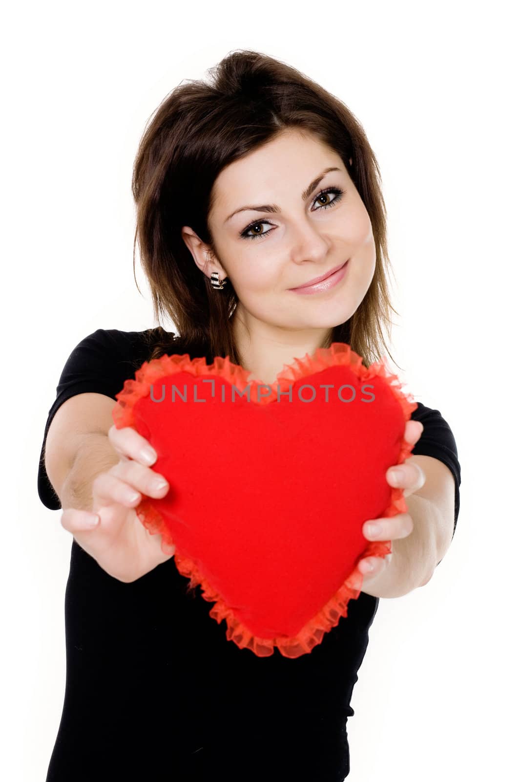 Stock photo: an image of a nice girl with a red heart in her hands
