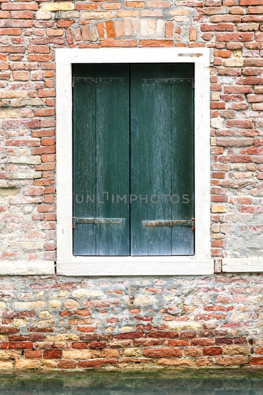 Windows of old house in Venice, Italy