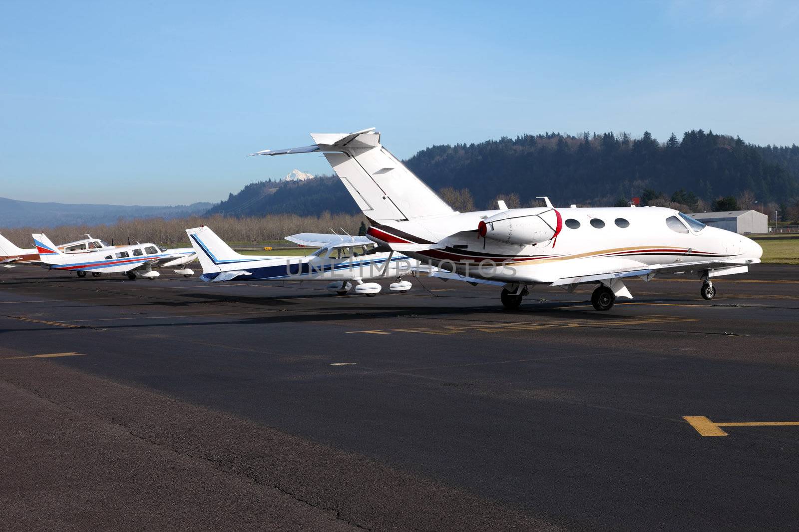 Aircraft of different models parked at the Troudale airport near Portland Oregon.
