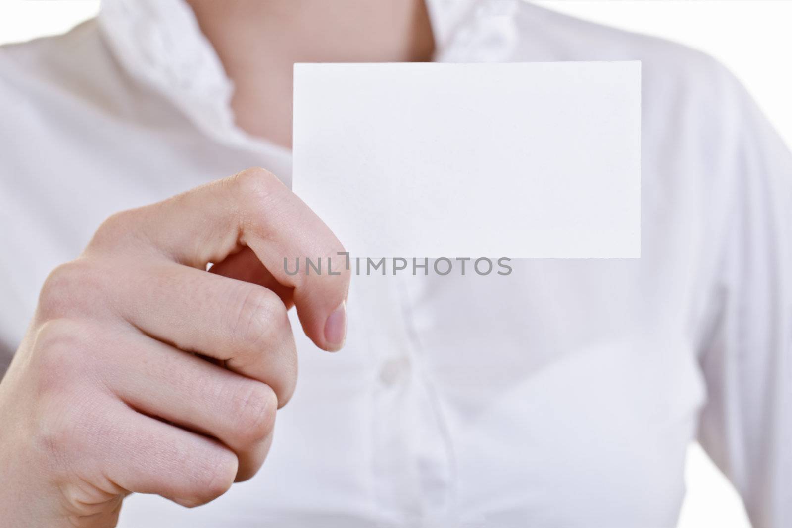 Businesswoman showing and handing a blank business card. Business woman in white shirt, high key. 