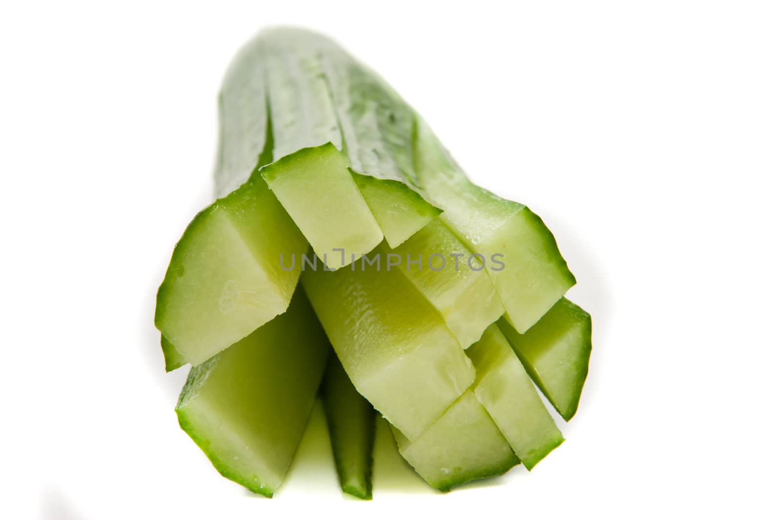 Picture of a cucumber sliced up the way a chef would do it