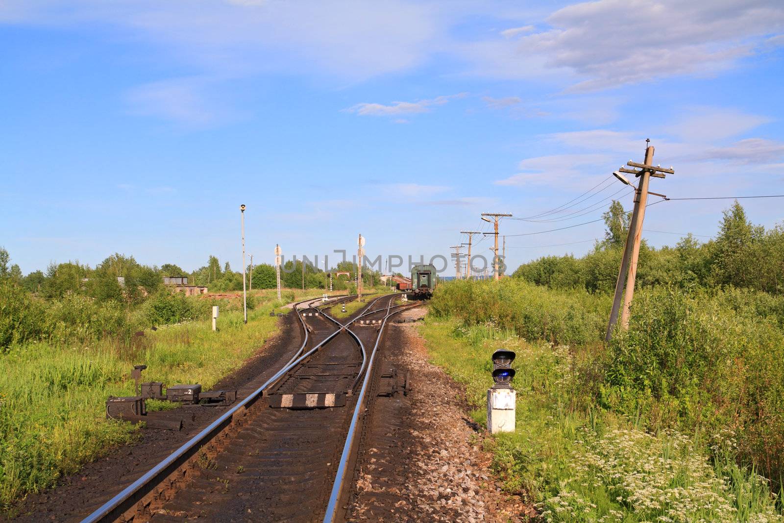 train on small railway station