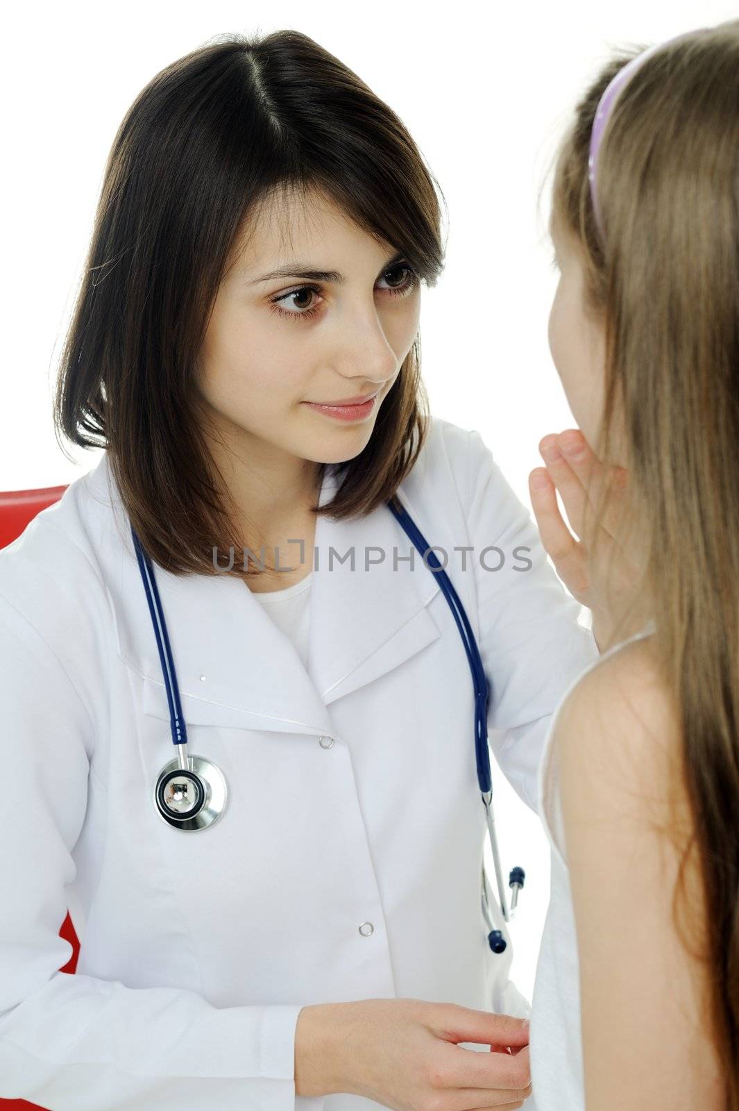An image of doctor looking at a child's tonsils