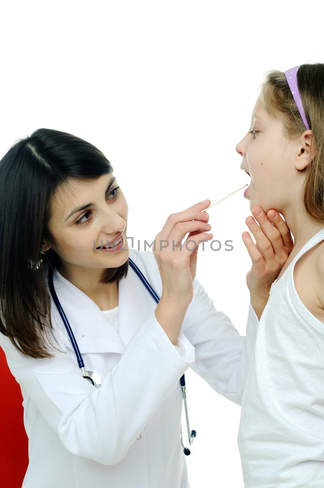 An image of doctor looking at a child's tonsils