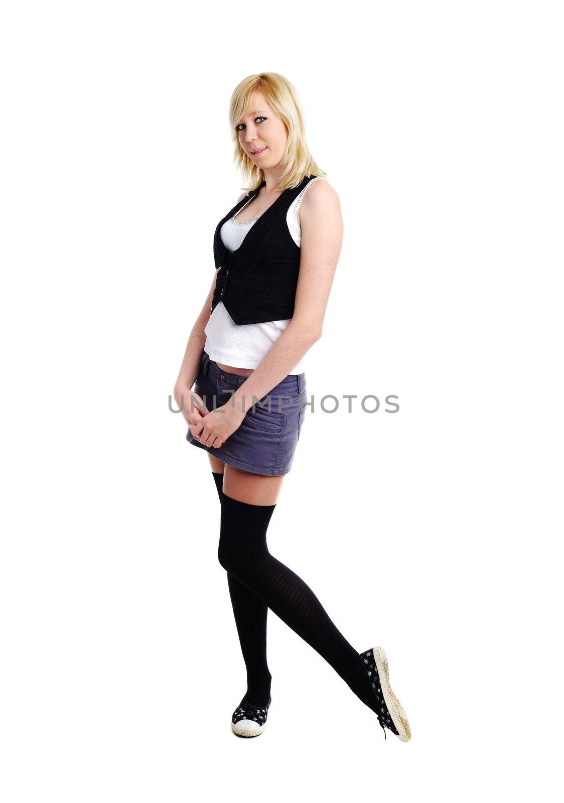 An image of a beautiful young girl in black stockings