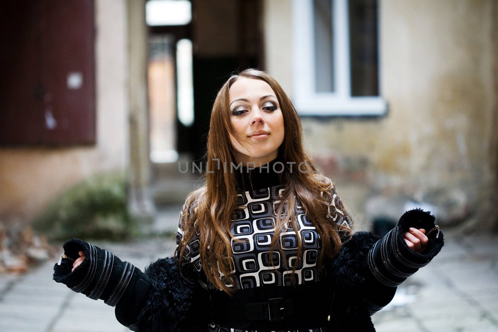 Stock photo: an image of a woman standing in the yard 
