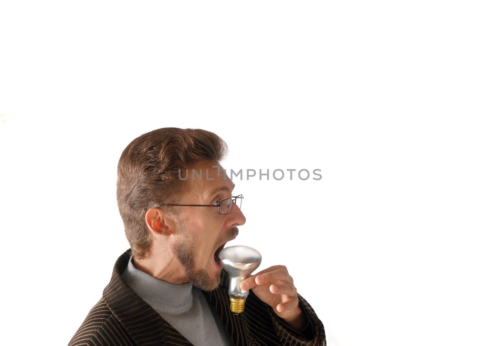 Businessman eating an electric lamp