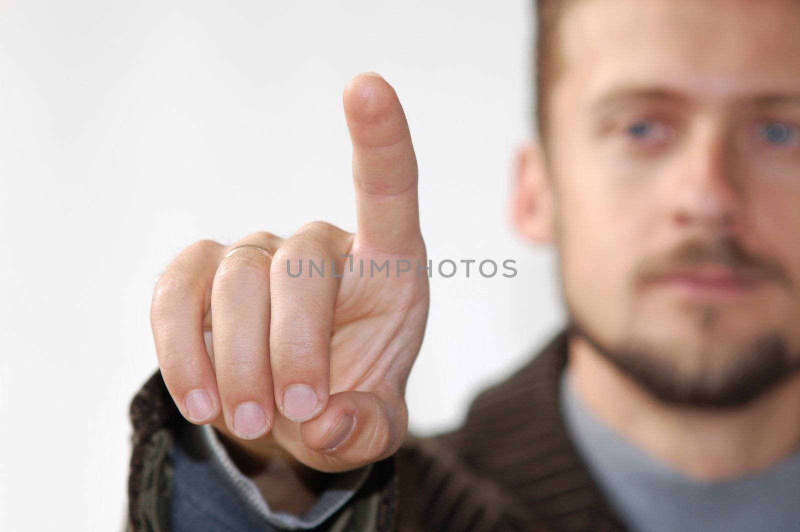 A businessman showing his thumb
