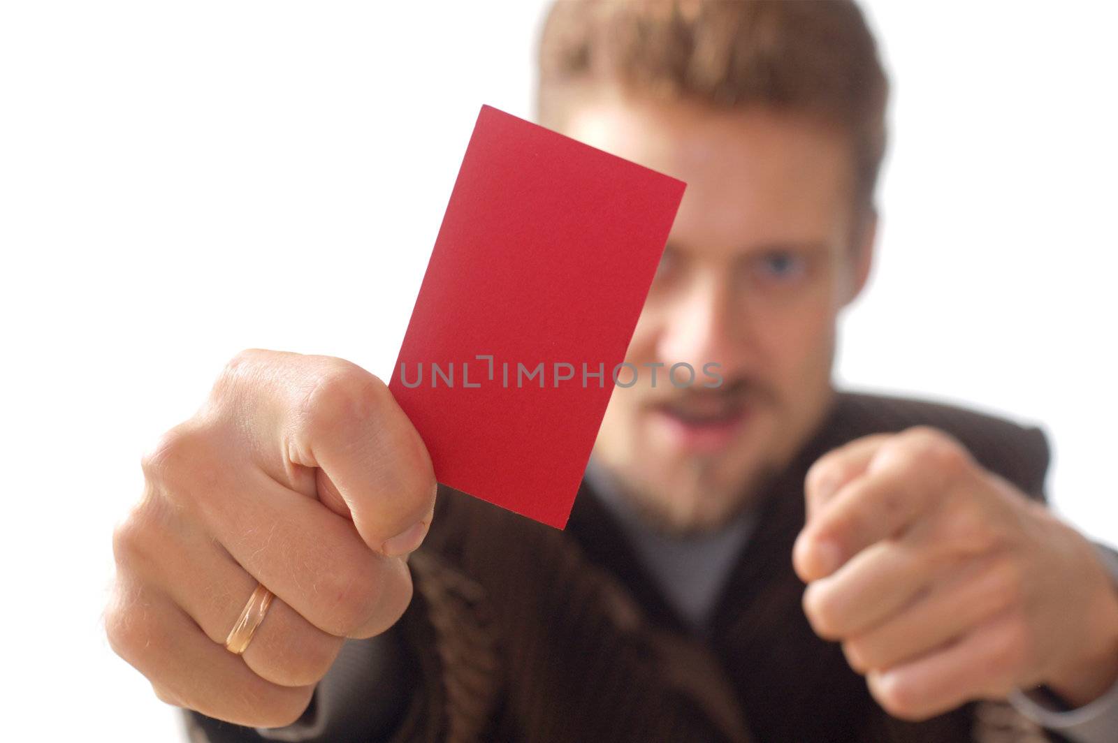 An image of bearded manager showing red card