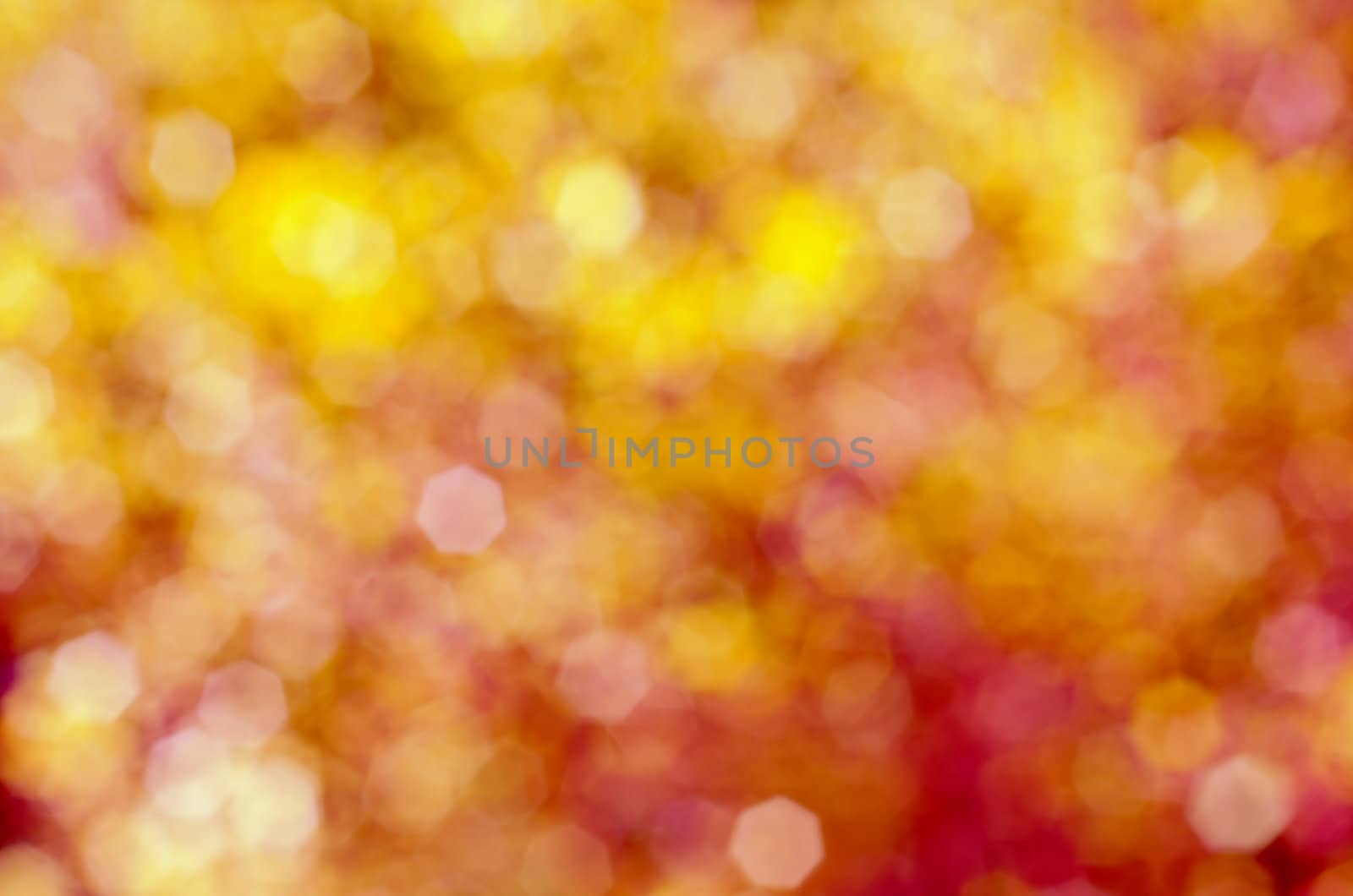 Soft, blurry, photographed bokeh background of pinks and yellows.  