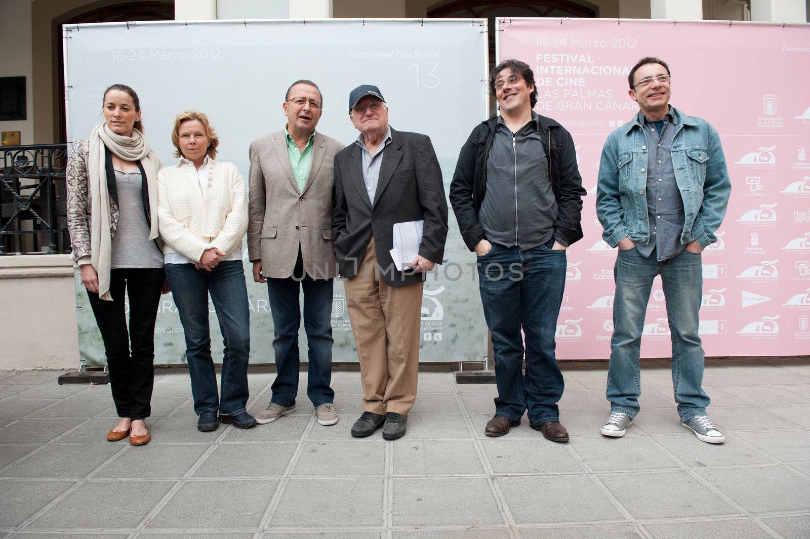 LAS PALMAS, SPAIN–MARCH 20: Vicente Aranda(m-r) and Claudio Utrera(m-l), with identified members of the Jury, during LPA International Film Festival on March 20, 2012 in Las Palmas, Spain

