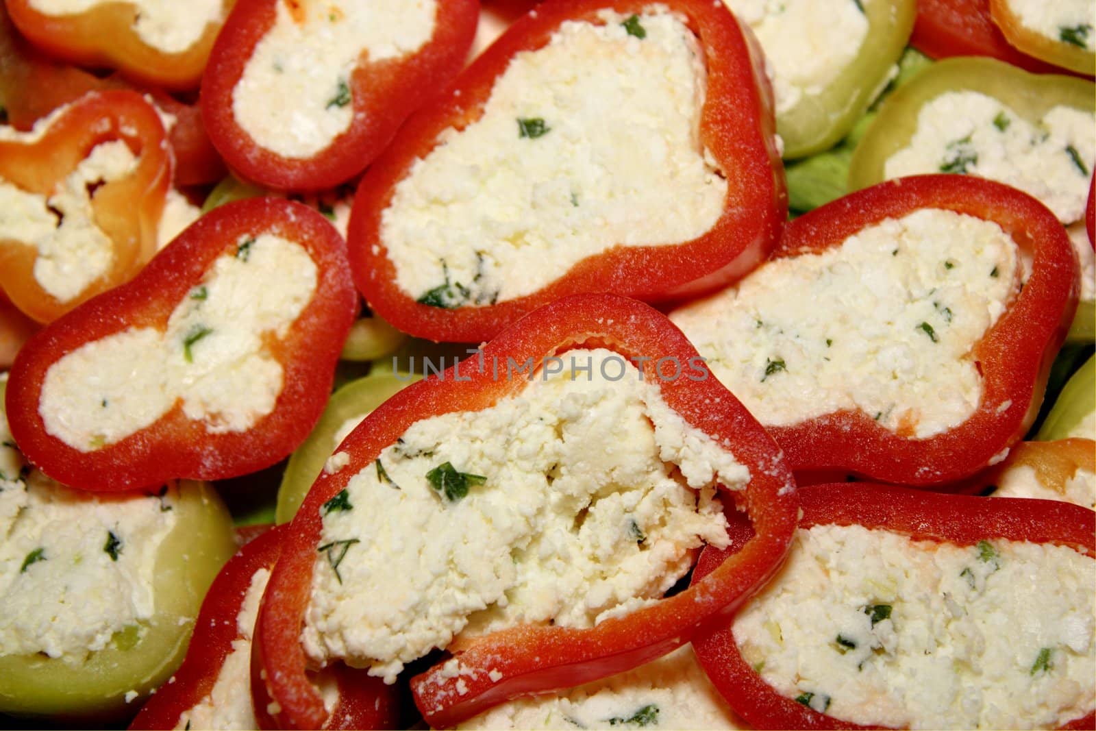 cheese paste inside bell pepper set on a plate