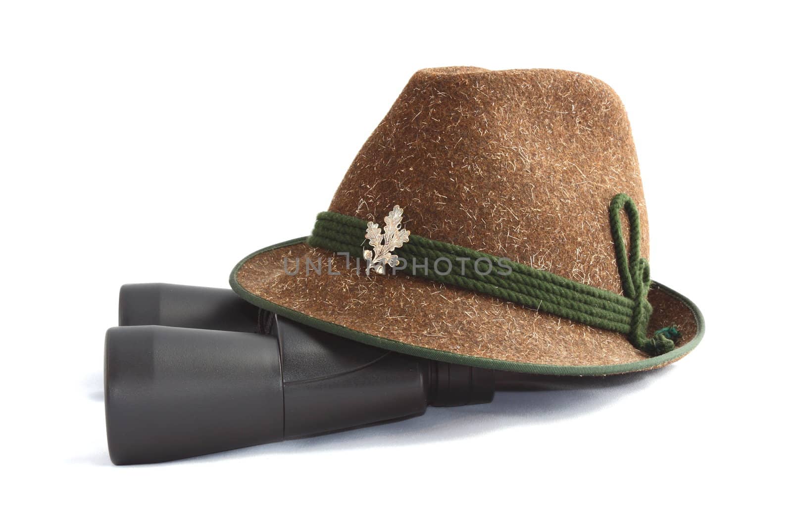 hunting equipment-old traditional wool hunting hat and binoculars