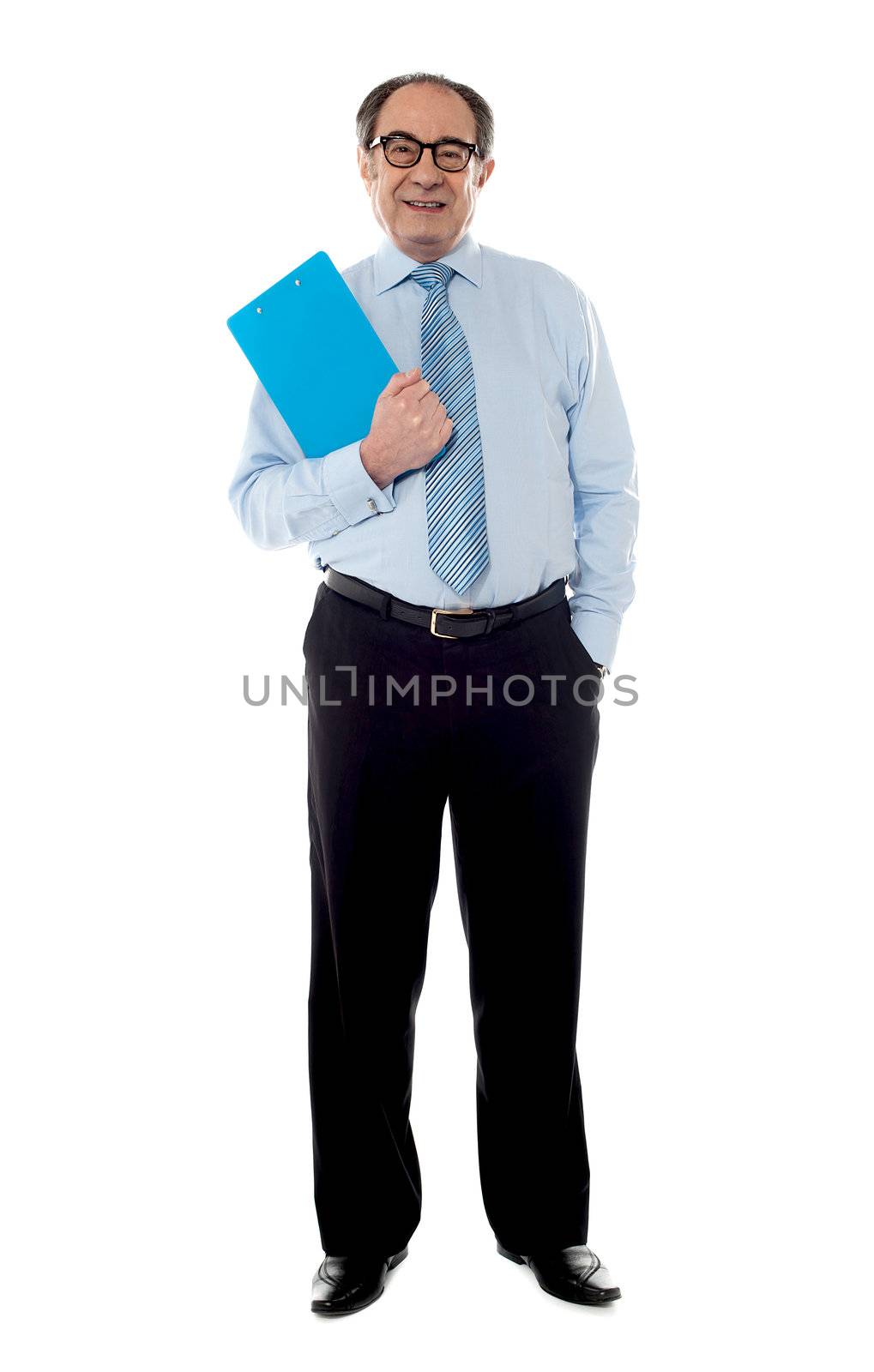 Corporate businessman holding document, posing in style