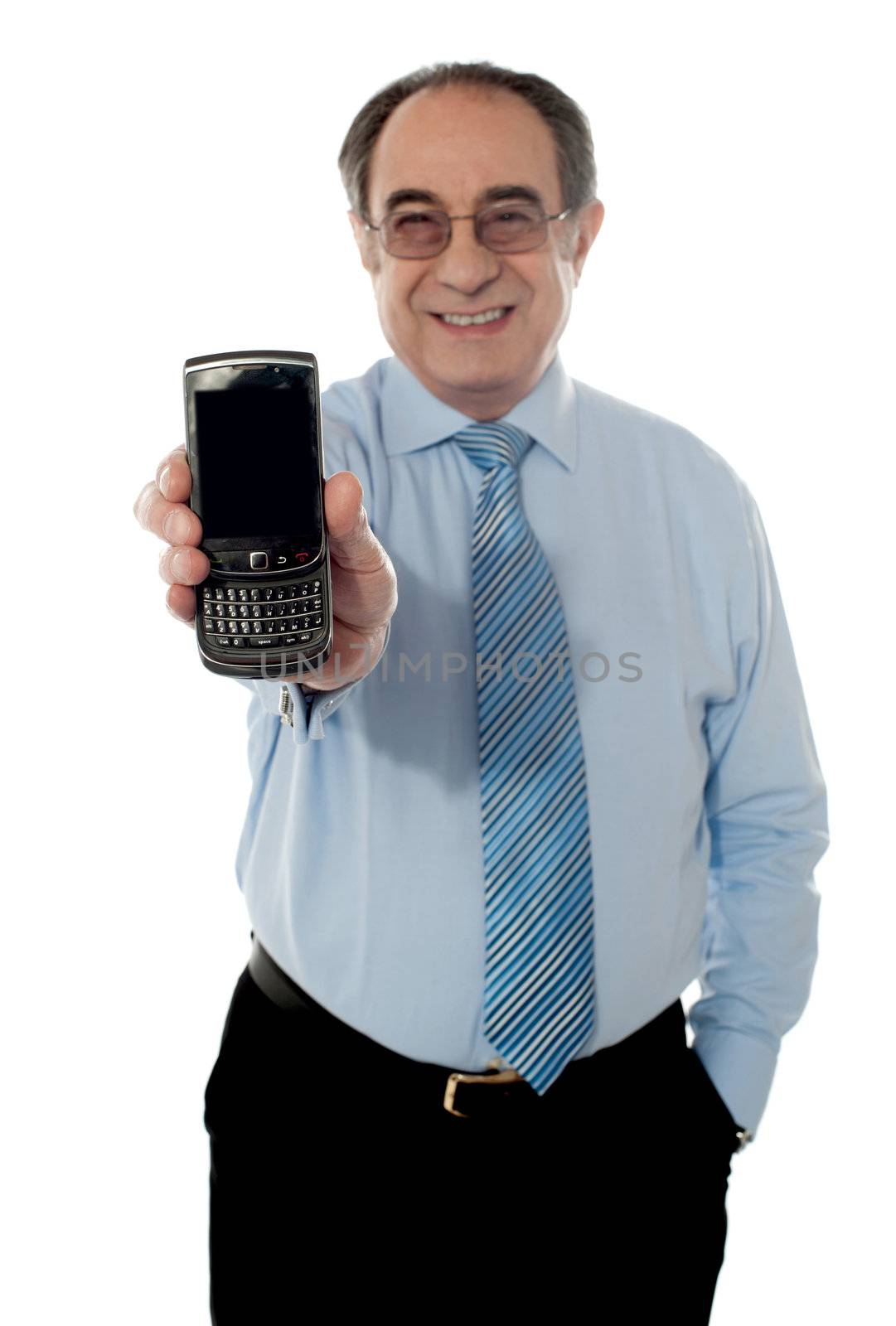 Senior sales manager promoting blackberry by stockyimages