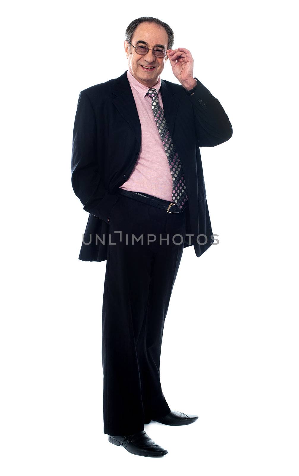 Old businessperson looking at you within his eye-wear isolated on white